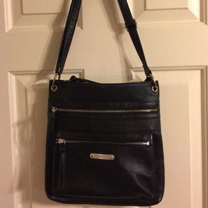 Slightly used Crossbody. Absolute mint condition